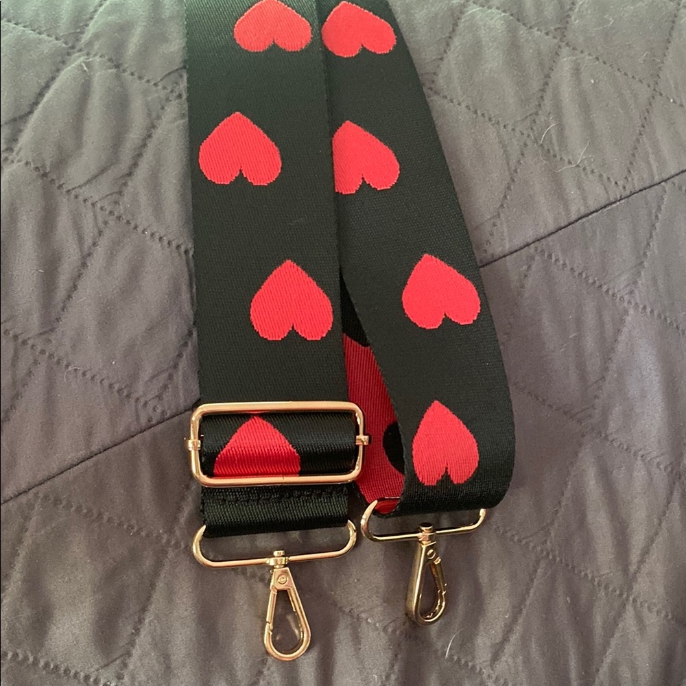 Claire's Black Strap with Red Hearts